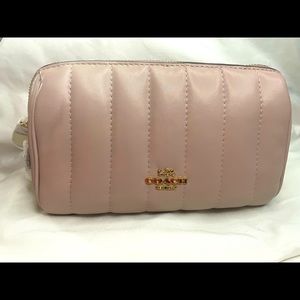 **BRAND NEW** blush pink Coach clutch